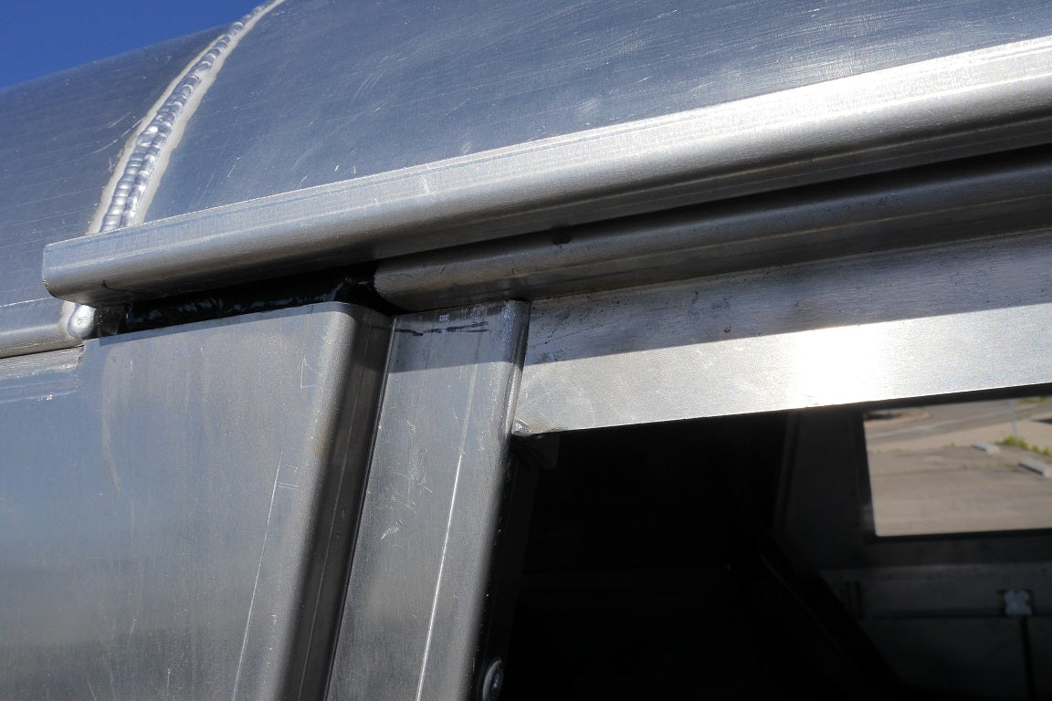 Close-up view of drip rail on a humvee hard top