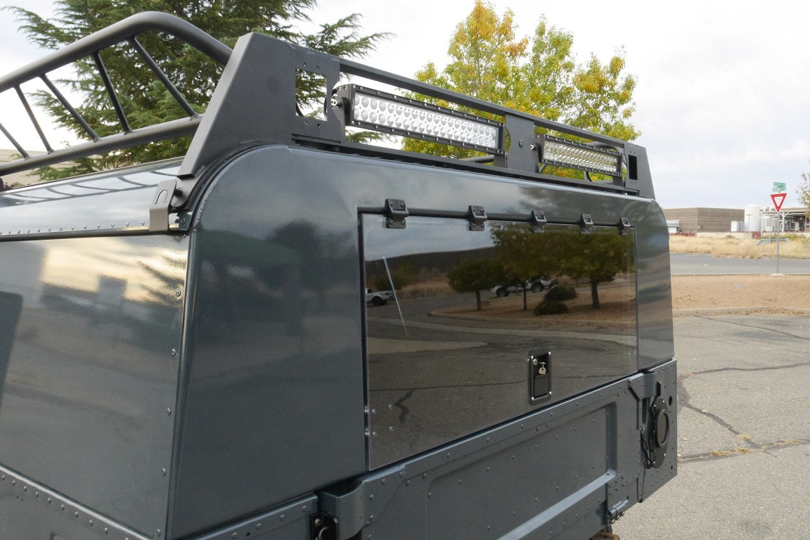 Close-up of powder-coated aluminum wagon back with polycarbonate lift gate for humvee